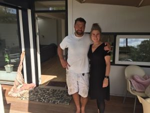 Jacon and partner inside their home in Saettedamen