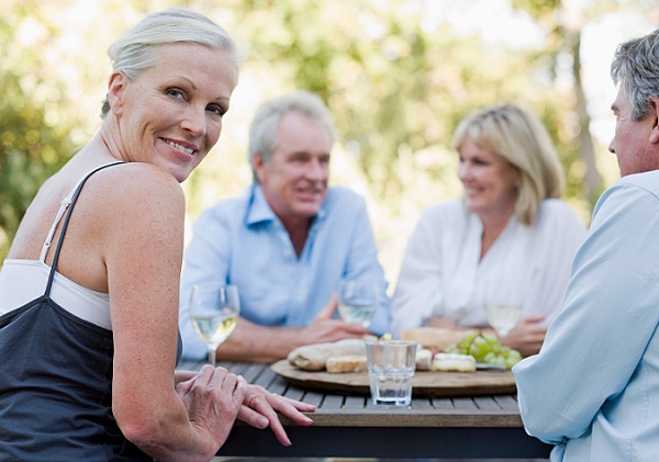 Friends at meal outdoors