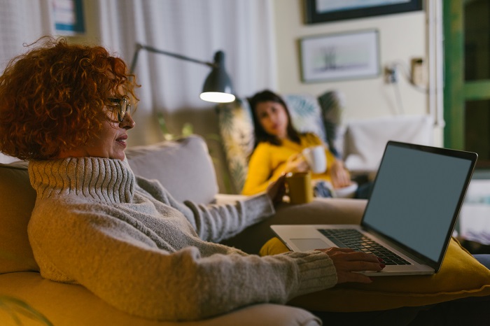 Woman,friends,enjoyed,company,,using,laptop,computer