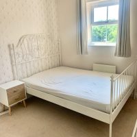 Old style nedframe with window behind in Wraysbury