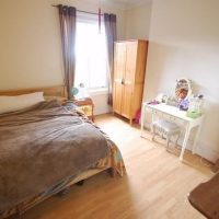 Photo of double room with wardrobe and dressing table