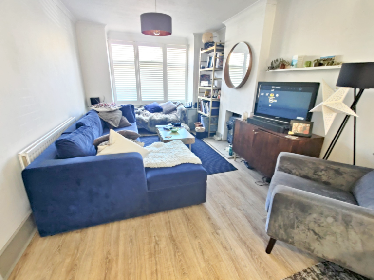 Cosy living space with wood burner and media systm Cosy living space with wood burner and media systm