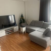 Photo of a lounge with large TV in Woolwich flat share