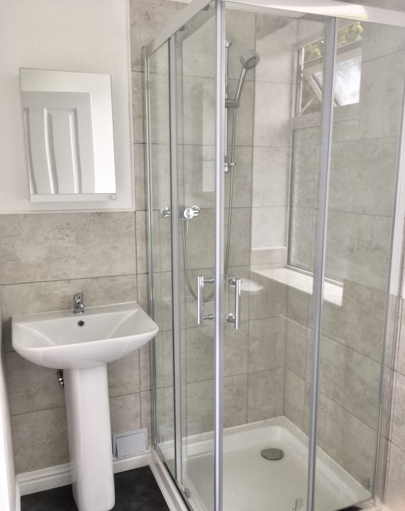 Communal bathroom 571x720